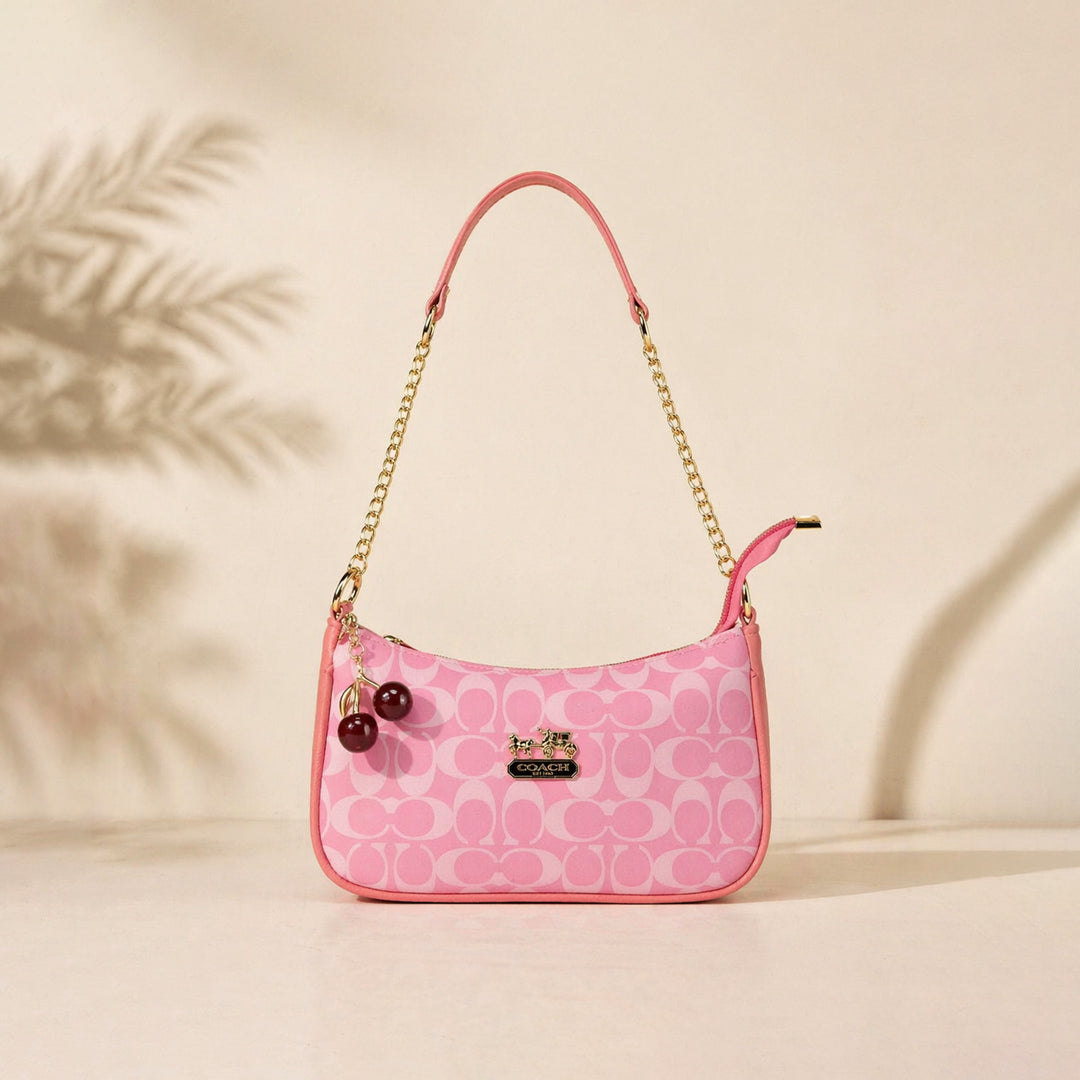 Chic Pink Coach Handbag with Cherry Charms 0091
